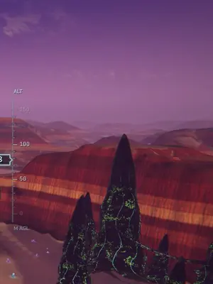 Hive spires glowing green rise from a red canyon.
